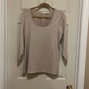 Beaded neck line.  Cream color.